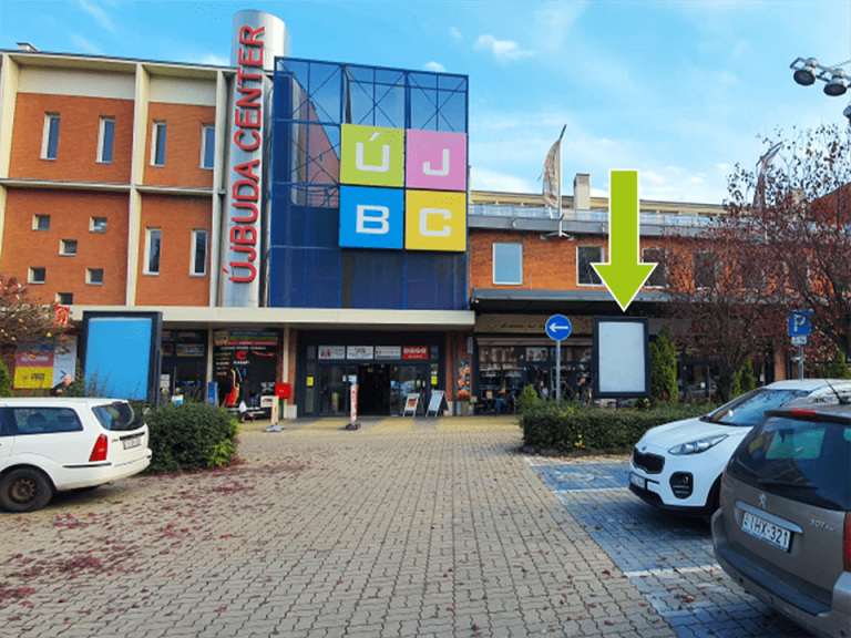 Budapest XI. kerület – Budafoki út 165., Újbuda Center parkoló, É-i bejárattól 6., üzletsorral párhuzamos, parkoló felé néző