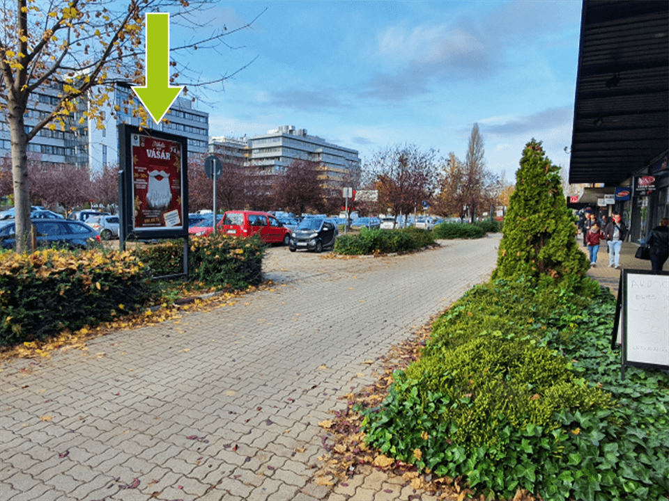 Budapest XI. kerület – Budafoki út 165., Újbuda Center parkoló, É-i bejárattól 7., üzletsorral párhuzamos,üzletsor felé néző