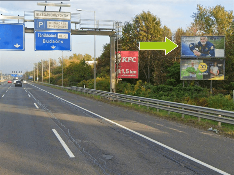 Budaörs – M1-M7 bevezető, Budapest felé, 12km+200, jobb oldalon felső