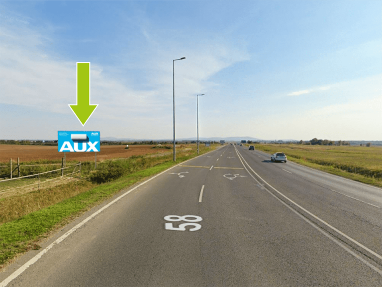 Pécs – 58-as főút, II. János Pál út körforgalom után 100m, centrum és TESCO felől,